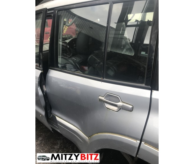SILVER REAR LEFT  DOOR PANEL ONLY FOR A MITSUBISHI PAJERO - V73W
