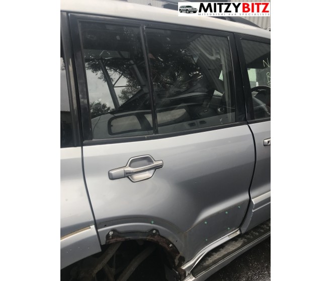 SILVER REAR RIGHT DOOR PANEL ONLY FOR A MITSUBISHI PAJERO/MONTERO - V75W