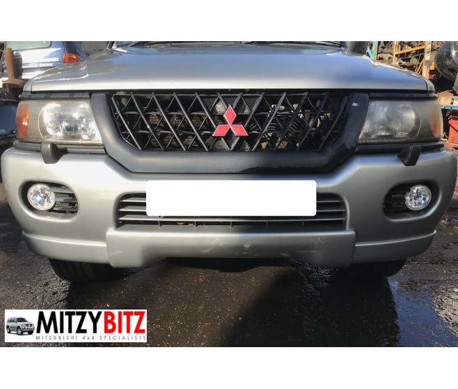 SILVER FRONT BUMPER WITH FOG LAMPS FOR A MITSUBISHI CHALLENGER - K99W