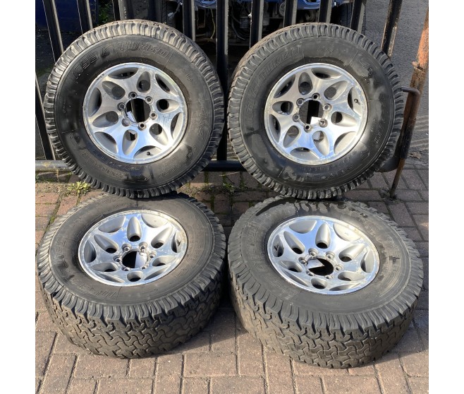 ALLOY WHEELS AND TYRE SET - SEE DESCRIPTION FOR A MITSUBISHI PAJERO/MONTERO - V45W