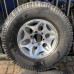 ALLOY WHEELS AND TYRE SET - SEE DESCRIPTION FOR A MITSUBISHI PAJERO/MONTERO - V24W