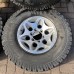 ALLOY WHEELS AND TYRE SET - SEE DESCRIPTION FOR A MITSUBISHI PAJERO/MONTERO - V45W