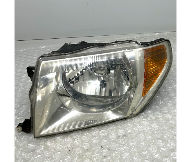 FRONT LEFT HEADLAMP FOR A MITSUBISHI PAJERO PININ/MONTERO IO - H67W