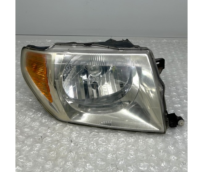 FRONT RIGHT HEADLAMP FOR A MITSUBISHI SHOGUN PININ / PAJERO IO - H60,70#