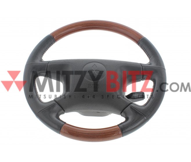 COMPLETE STEERING WHEEL FOR A MITSUBISHI GENERAL (EXPORT) - STEERING