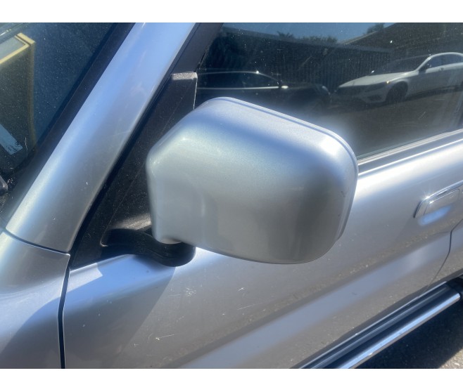 LEFT DOOR MIRROR FOR A MITSUBISHI PAJERO PININ/MONTERO IO - H77W