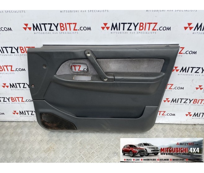 FRONT RIGHT DOOR CARD( GREY CLOTH ) FOR A MITSUBISHI PAJERO - V23W