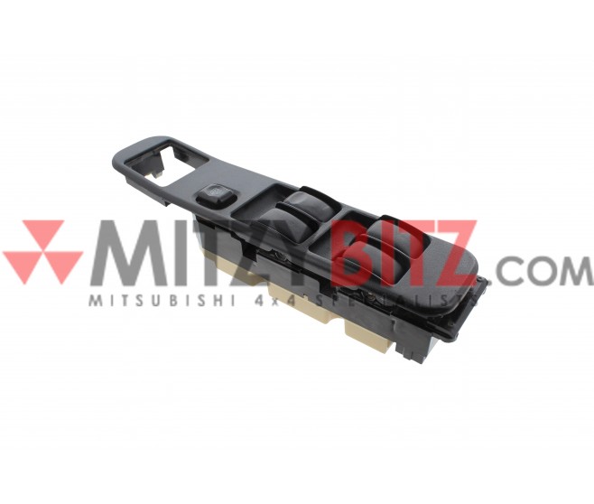 FRONT RIGHT MASTER WINDOW SWITCH AND TRIM FOR A MITSUBISHI L200 - K67T