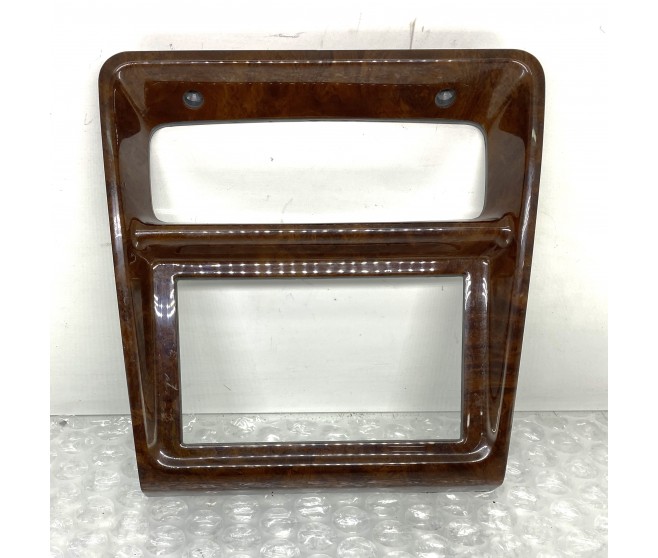 SURROUND WITH WOOD EFFECT TRIM FOR A MITSUBISHI V20-50# - I/PANEL & RELATED PARTS