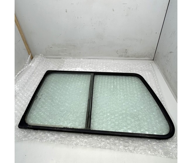 REAR L/H SLIDING GLASS WINDOW FOR A MITSUBISHI V10-40# - QTR WINDOW GLASS & MOULDING