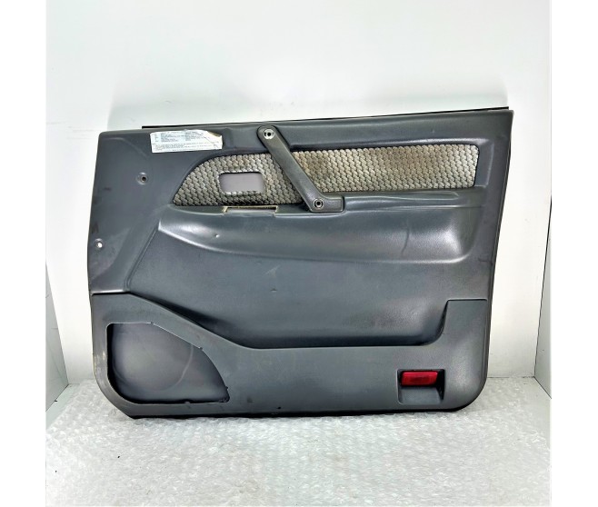 DOOR CARD FRONT RIGHT FOR A MITSUBISHI V10-40# - FRONT DOOR TRIM & PULL HANDLE