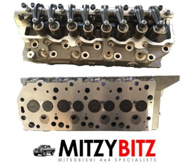 BUILT UP FLUSH VALVE CYLINDER HEAD FOR A MITSUBISHI PA-PF# - CYLINDER HEAD