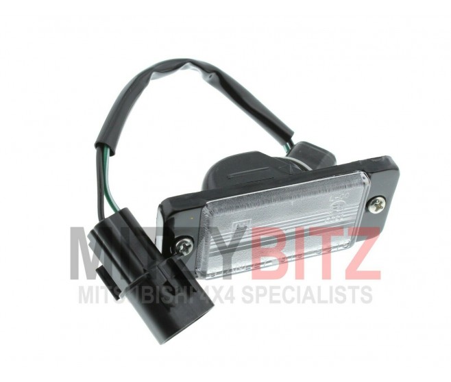 LICENSE NUMBER PLATE LAMP REAR FOR A MITSUBISHI L200 - K76T